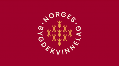 Norges Bygdekvinnelags logo på mørk rød bakgrunn